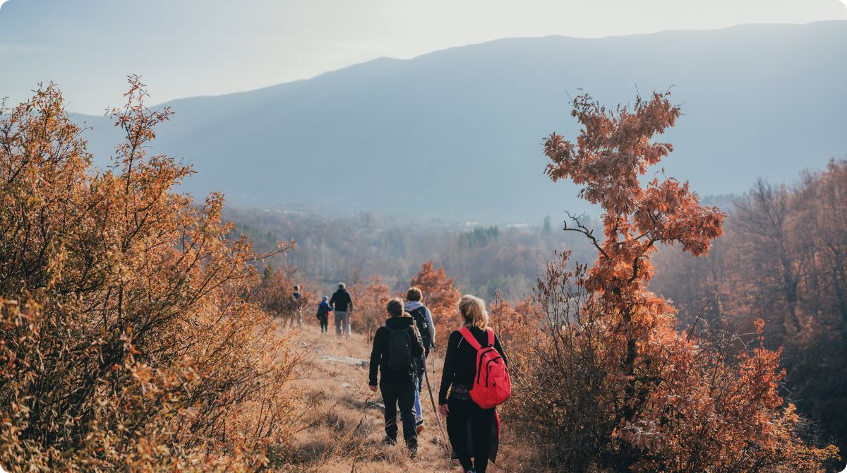 family hiking in fall